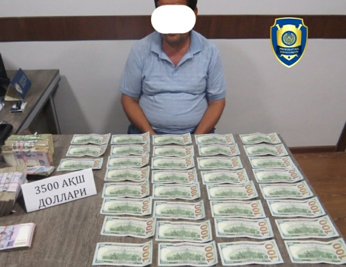 Bo‘stonliq va Paxtakor tumanlarida chet el valyutasini noqonuniy muomalaga kiritilishining oldi olindi