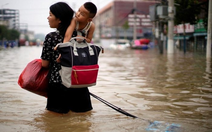 Хитойда кучли ёмғир 30 кишининг ҳаётига зомин бўлди