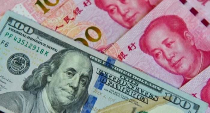 Хитой юани АҚШ билан келишувдан манфаат кўрди